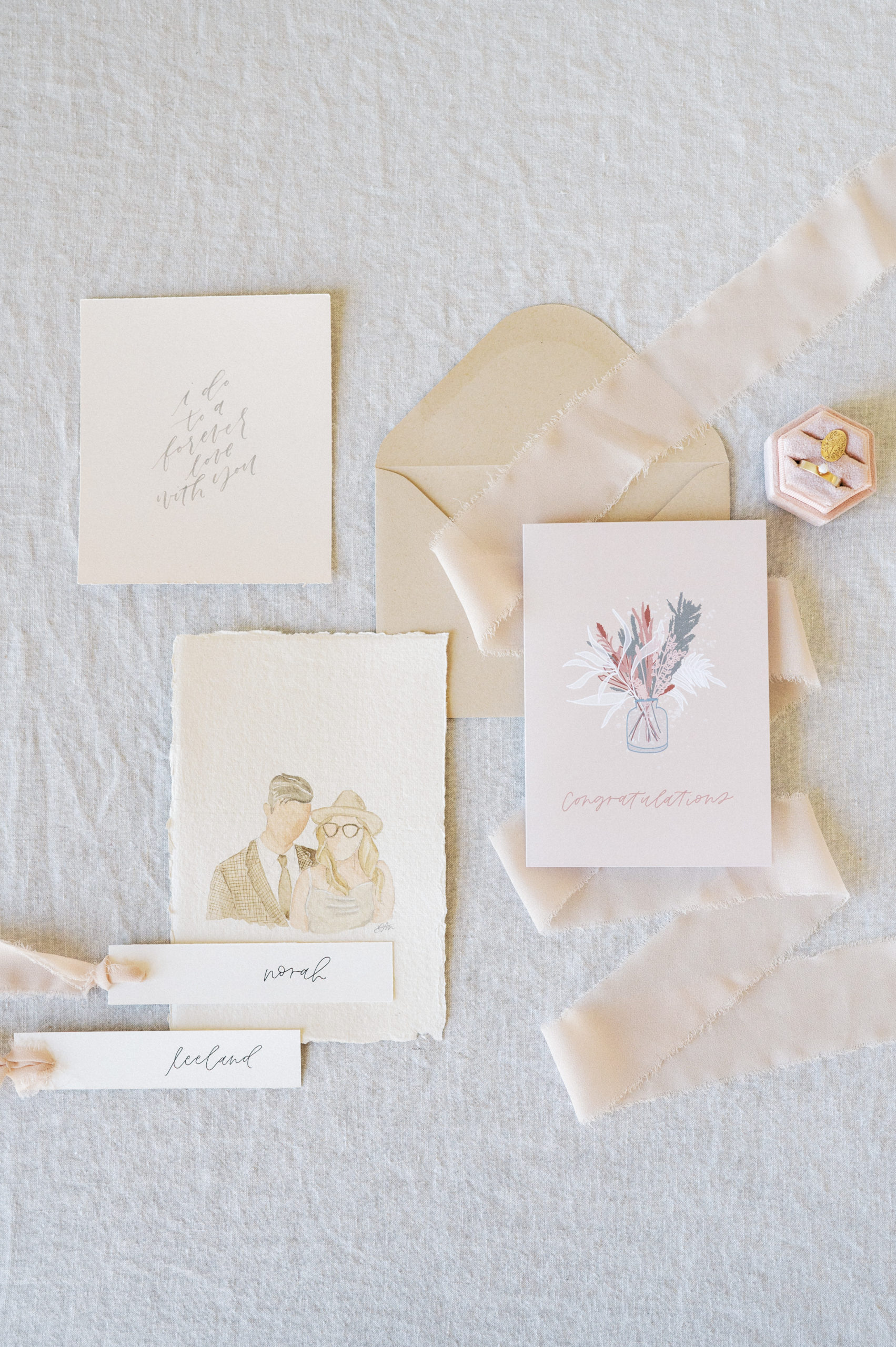 Flat lay of neutral coloured stationery by Jars of Clay Calligraphy